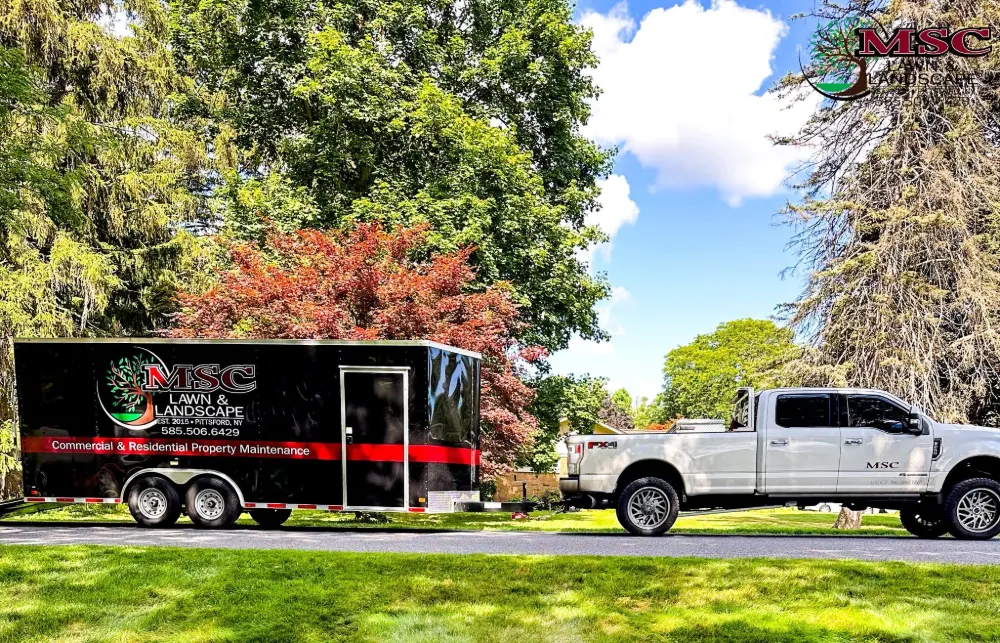 The MSC truck and black enclosed trailer, lettered Commercial & Residential Property Maintenance
